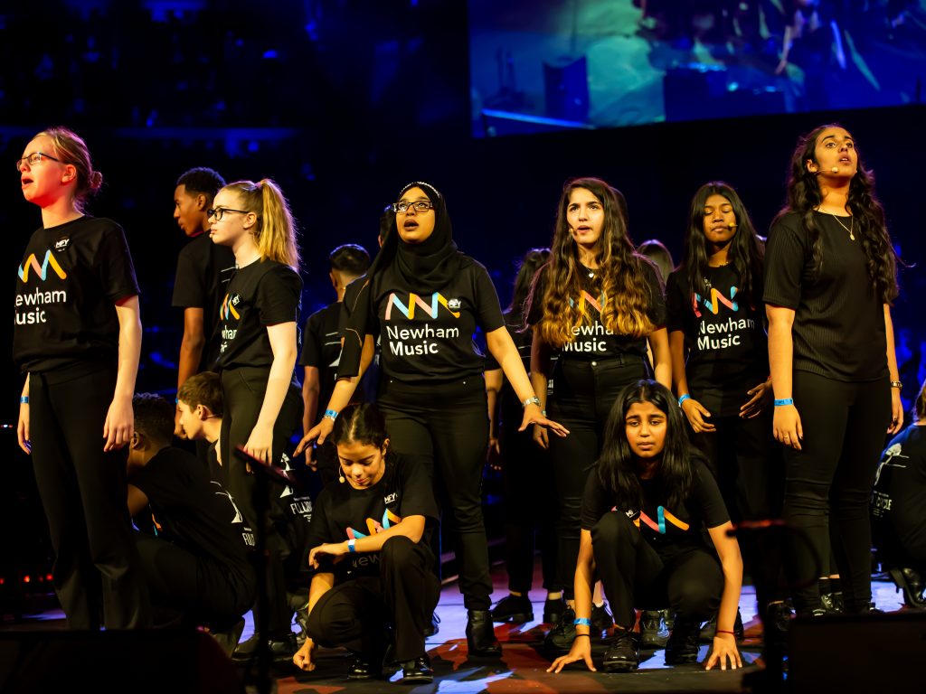 a group of young people on stage